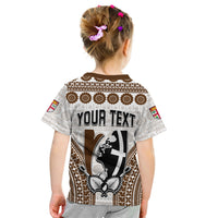 White crew-neck t-shirt with brown tapa trim and 'YOUR TEXT' back print