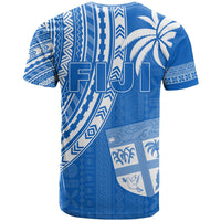 Blue rugby sevens T-shirt with large Fiji 7s text, palm tree art, white geometric stripes