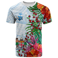 Fiji tropical T-shirt with floral print, green leaves, red flowers and tapa pattern sleeves
