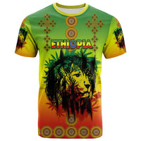 Front view gradient green-yellow-red tee with Ethiopia lettering, lion portrait, red cross ornaments.