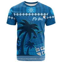 Blue T-shirt with tapa patterns, palm trees, and white flower motif on front