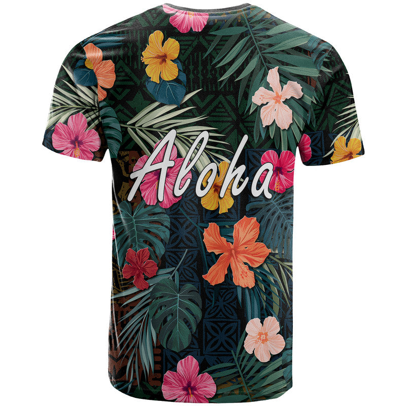 Hawaiian T-shirt with large 'Aloha' text and tropical hibiscus leaf print, dark green