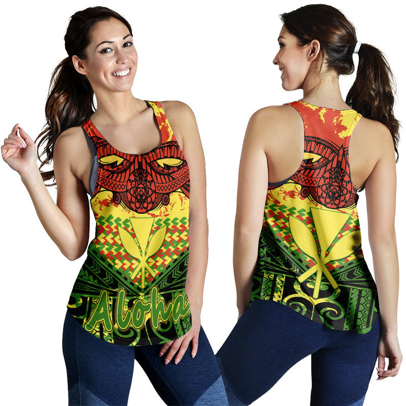 Women’s racerback tank worn by model, tribal print in red yellow green