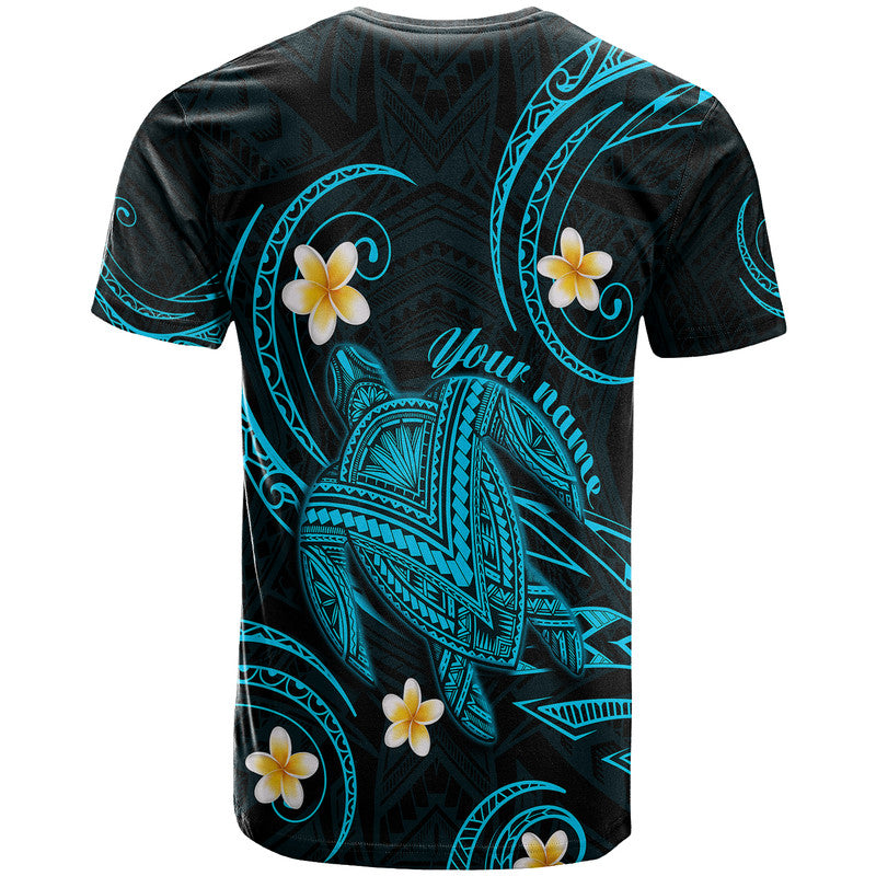 Turquoise-and-black tropical turtle T-shirt back view with plumeria and tribal script