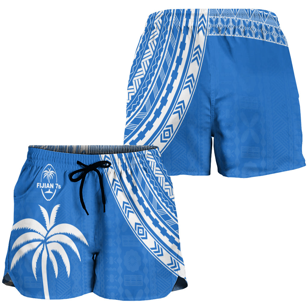 Women's blue rugby shorts, side view with white geometric print and elastic waist drawstring