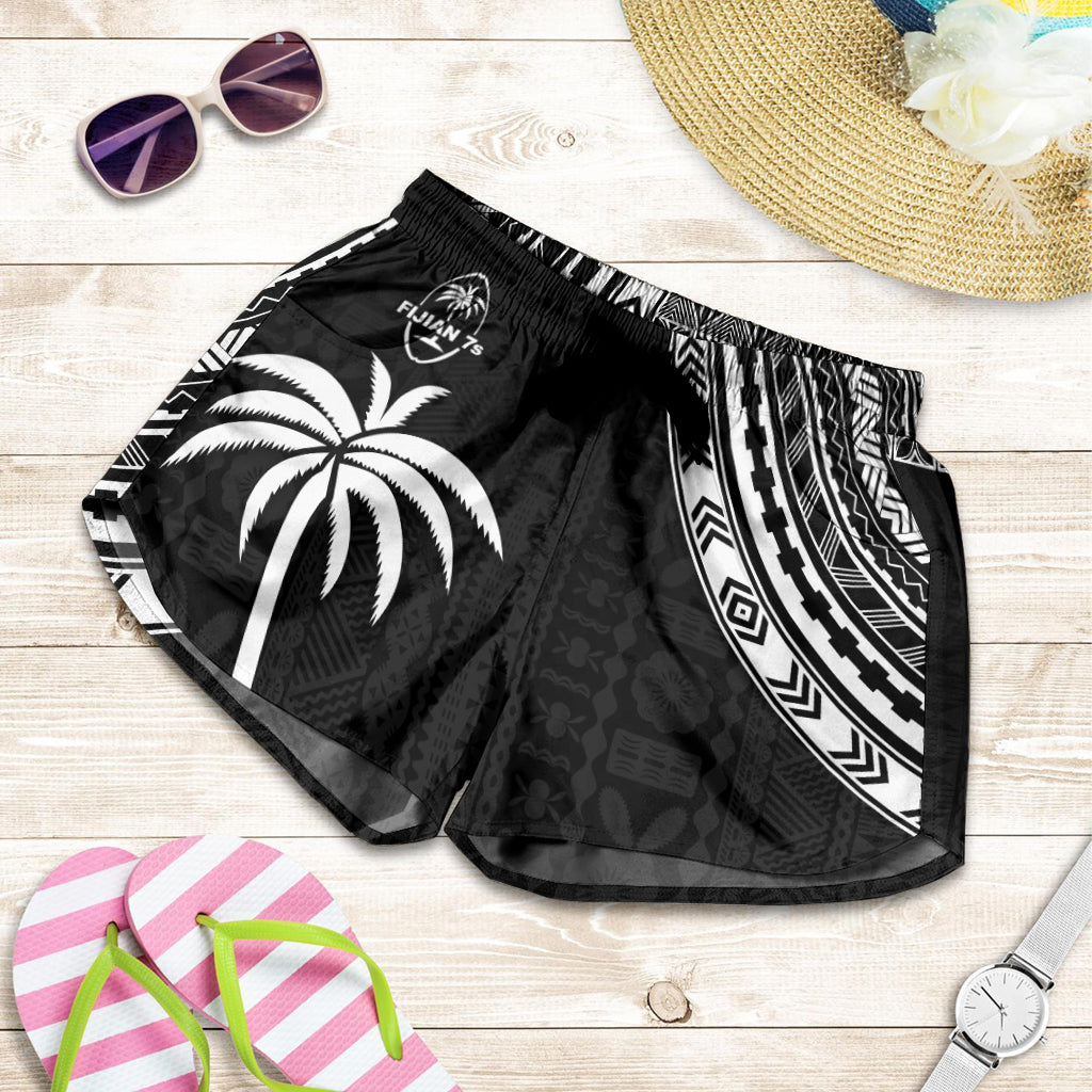 Women’s black rugby sevens shorts with palm logo, white geometric trim, drawstring waist
