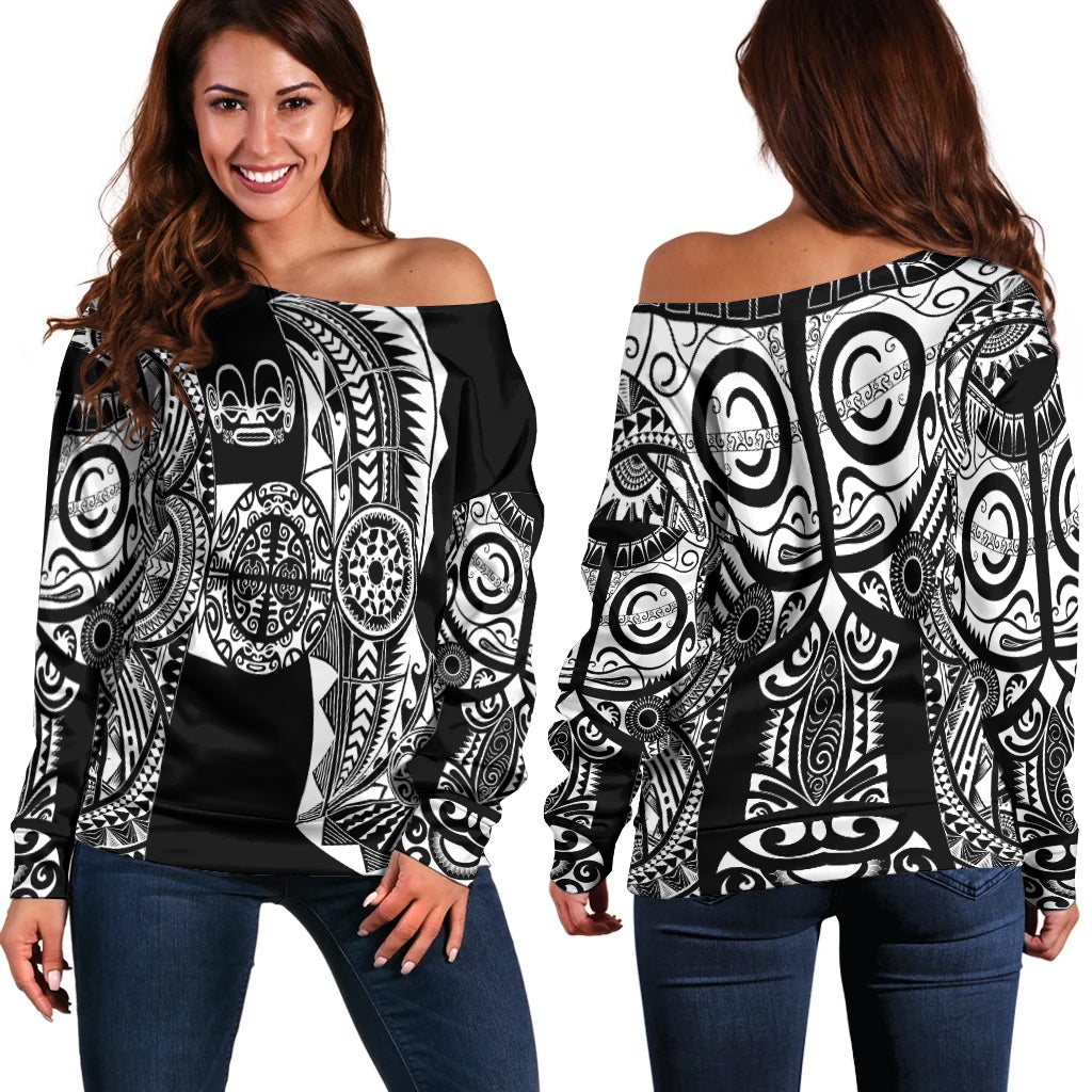 Women’s off-shoulder black long-sleeve top with bold Polynesian tattoo print