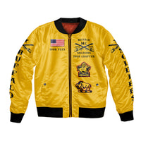 Gold bomber jacket with zip front, front patches, and black ribbed collar and cuffs.