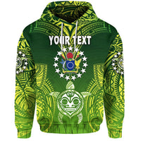 Green hoodie front with centered emblem collage, custom text across chest, hooded