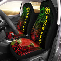 Black car seat covers with green/yellow “YOUR TEXT” and red floral tribal design