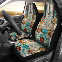 Turquoise blue patterned car seat covers with beaded medallion and geometric motifs