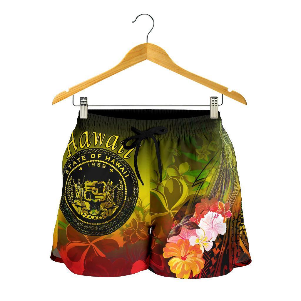 Yellow tropical floral swim shorts on wooden hanger, elastic waistband and drawstring