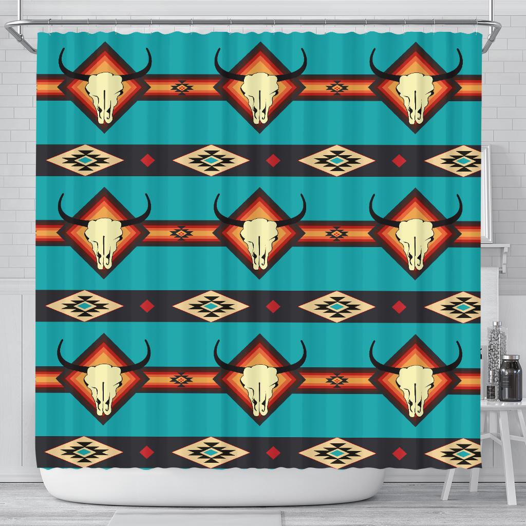 Blue shower curtain with repeating bull skull and Southwestern diamond pattern