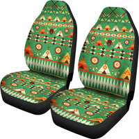 Pair of green bison-pattern car seat covers with multicolor tribal motifs