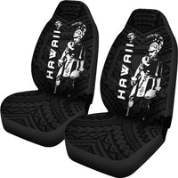 Black front seat covers with Polynesian warrior helmet graphic and tribal patterns