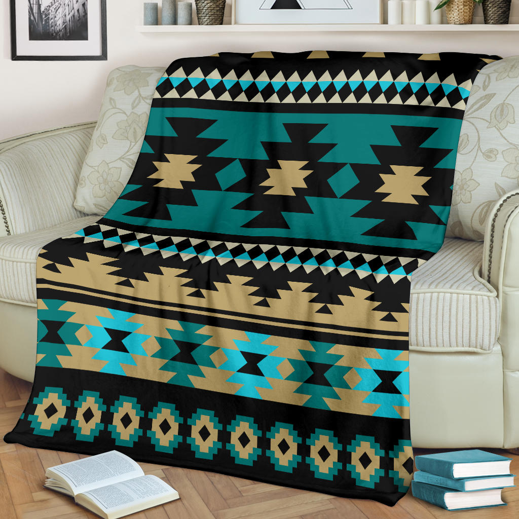 Teal, tan, and black Aztec blanket with zigzag triangles and diamond border