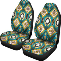 Set of two turquoise geometric seat covers with zigzag and diamond motifs