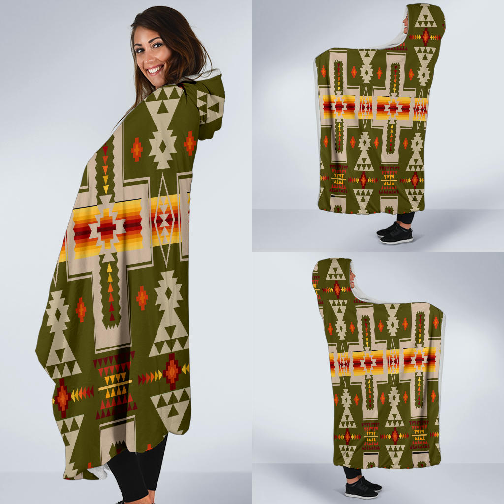 Hooded blanket with multicolor geometric design, olive base; draped on model