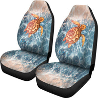 Pair of universal seat covers: front seats with turtle graphic and speckled beige cushion