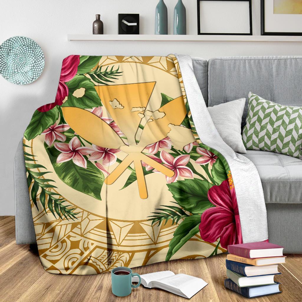 Gold tropical hibiscus and plumeria throw blanket with palm fronds and geometric borders