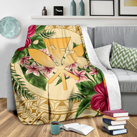 Gold tropical hibiscus and plumeria throw blanket with palm fronds and geometric borders