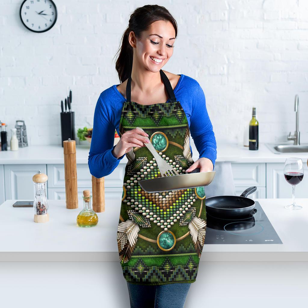 Green mandala apron with central beaded heart design and turquoise medallion accents