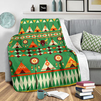 Green throw blanket with tents, bison, circular dreamcatchers, and zigzag trim