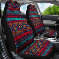 Car interior view: LT10 colorful tribal seat covers with black backing and red/teal pattern