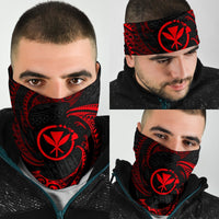 Red tribal wave bandana pulled over face and head, black fabric with large red emblem