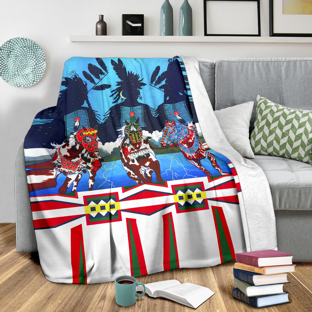 Horse costume blanket on bed with white edging, three costumed horses on blue and striped hem