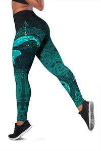 Black and teal Viking leggings with raven head graphic and ornate rune patterns, full length