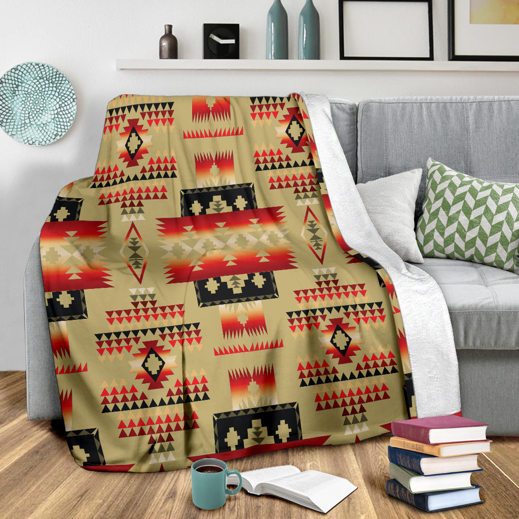 Light brown Native-style blanket with red stripe bands and black cross accents