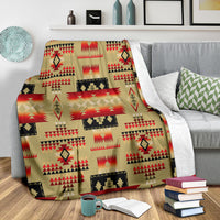 Light brown Native-style blanket with red stripe bands and black cross accents