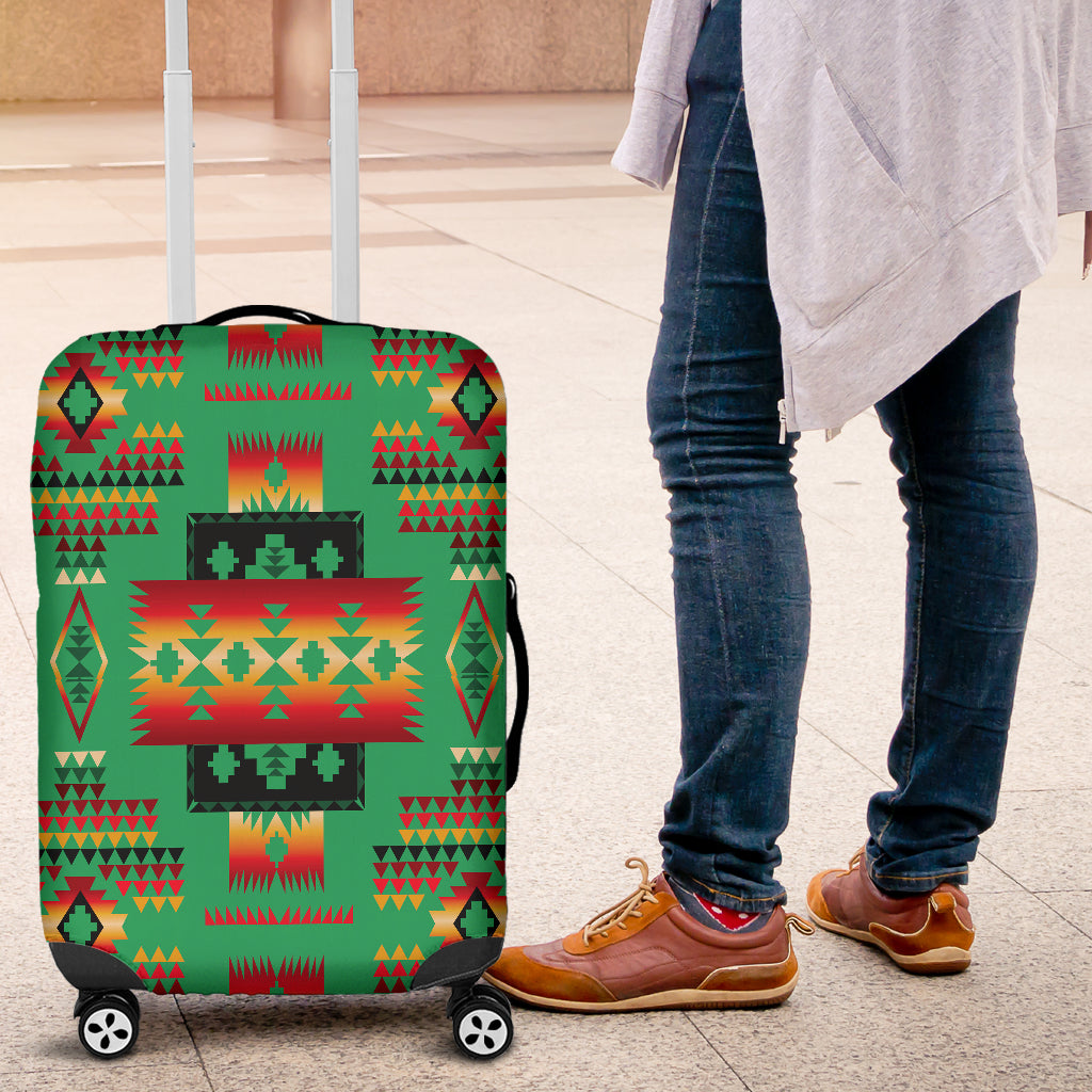 Green multicolor Native-style luggage cover on rolling suitcase, angled side view