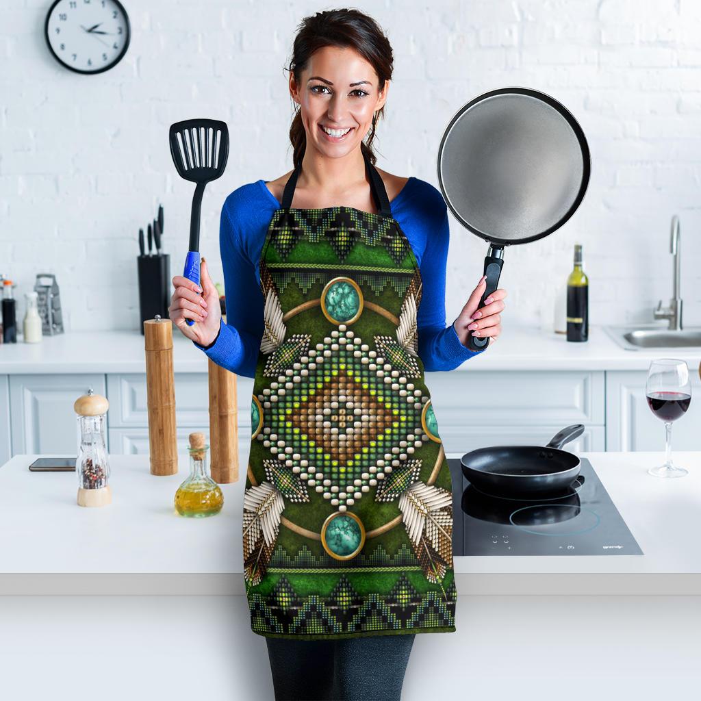 Green mandala apron with fringed feather-like side details and turquoise round medallions