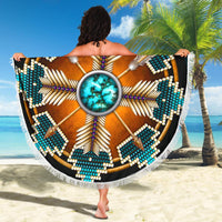 Hanging round beach blanket with turquoise-blue mandala design, central turquoise stone, white fringe