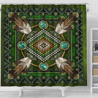 Green shower curtain close-up of beaded mandala center with turquoise round accents