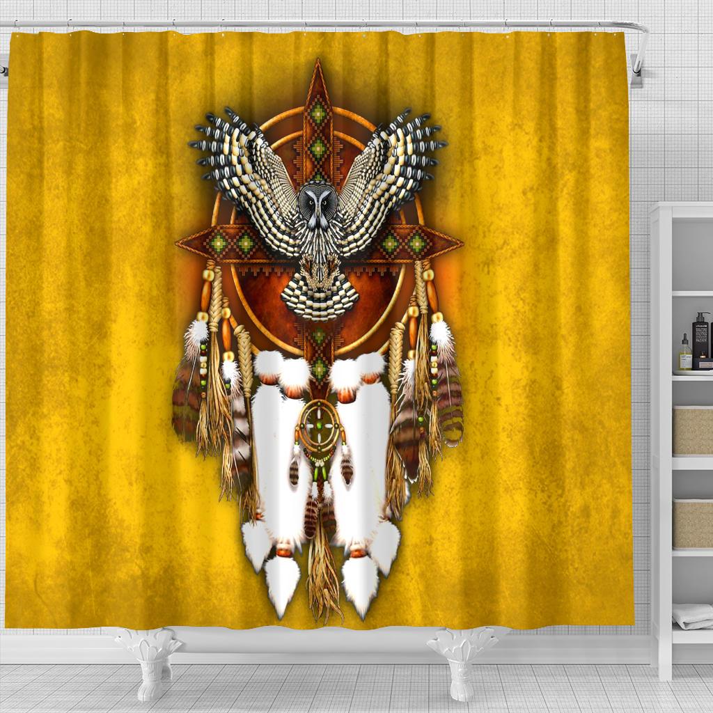 Close-up yellow shower curtain with owl dreamcatcher graphic and hanging tassels