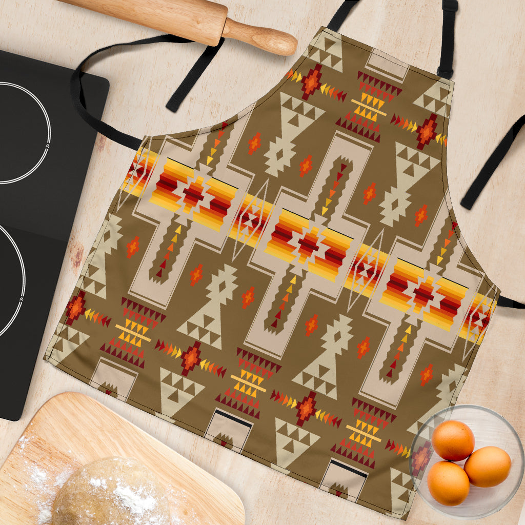 Close-up light brown apron fabric with multicolor tribal geometric design and black ties