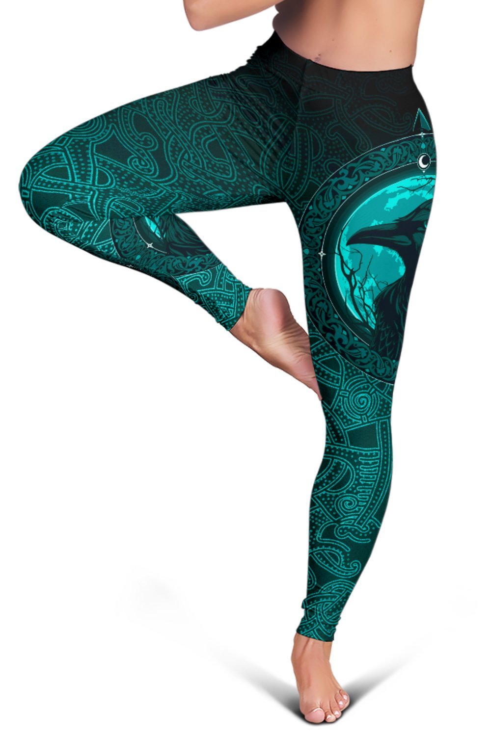 Teal raven graphic leggings with black upper, rune border around eye