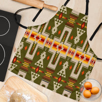 Close-up of green apron fabric with colorful native geometric pattern and black trim