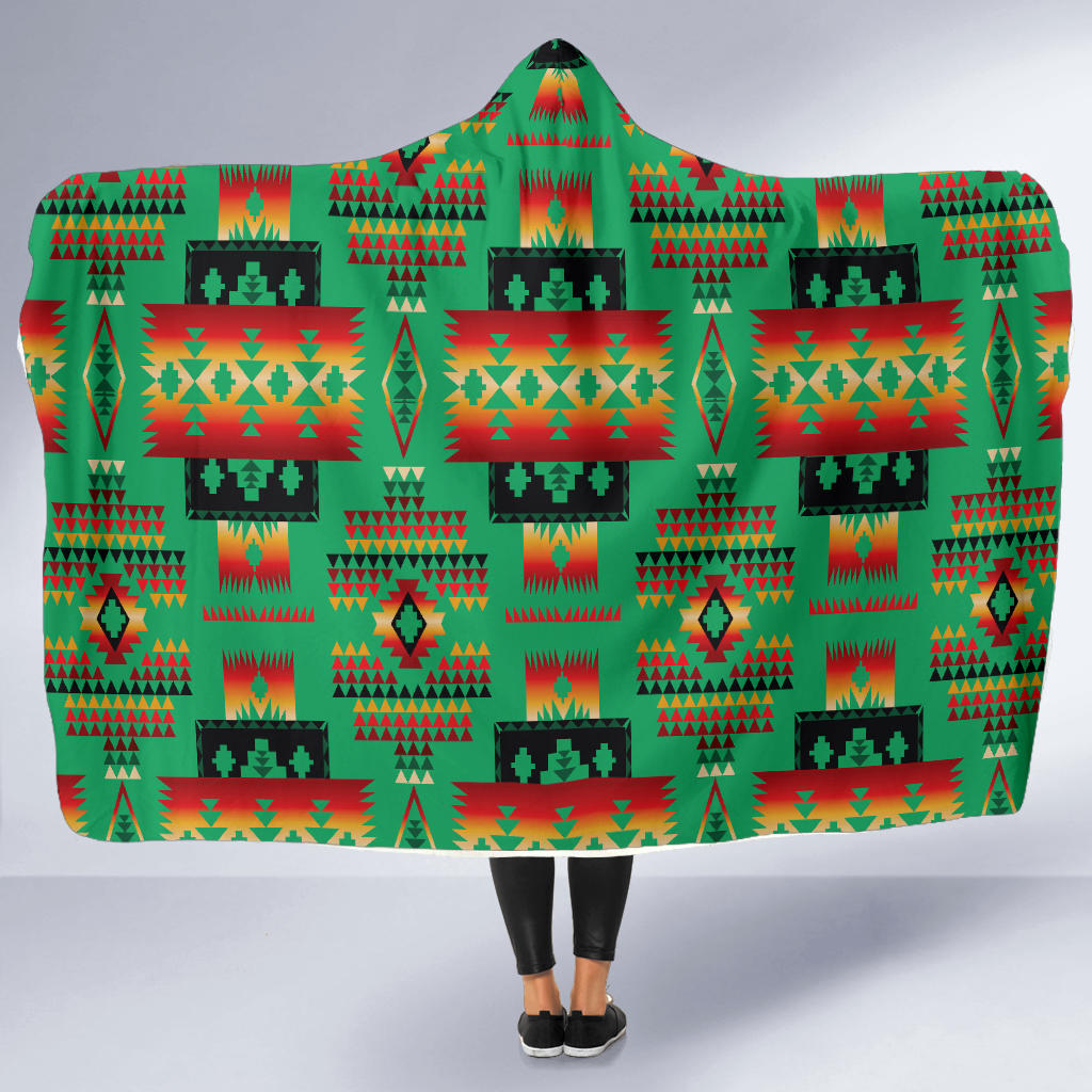 Green hooded blanket with multicolor Native American geometric pattern, flat front view