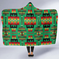 Green hooded blanket with multicolor Native American geometric pattern, flat front view