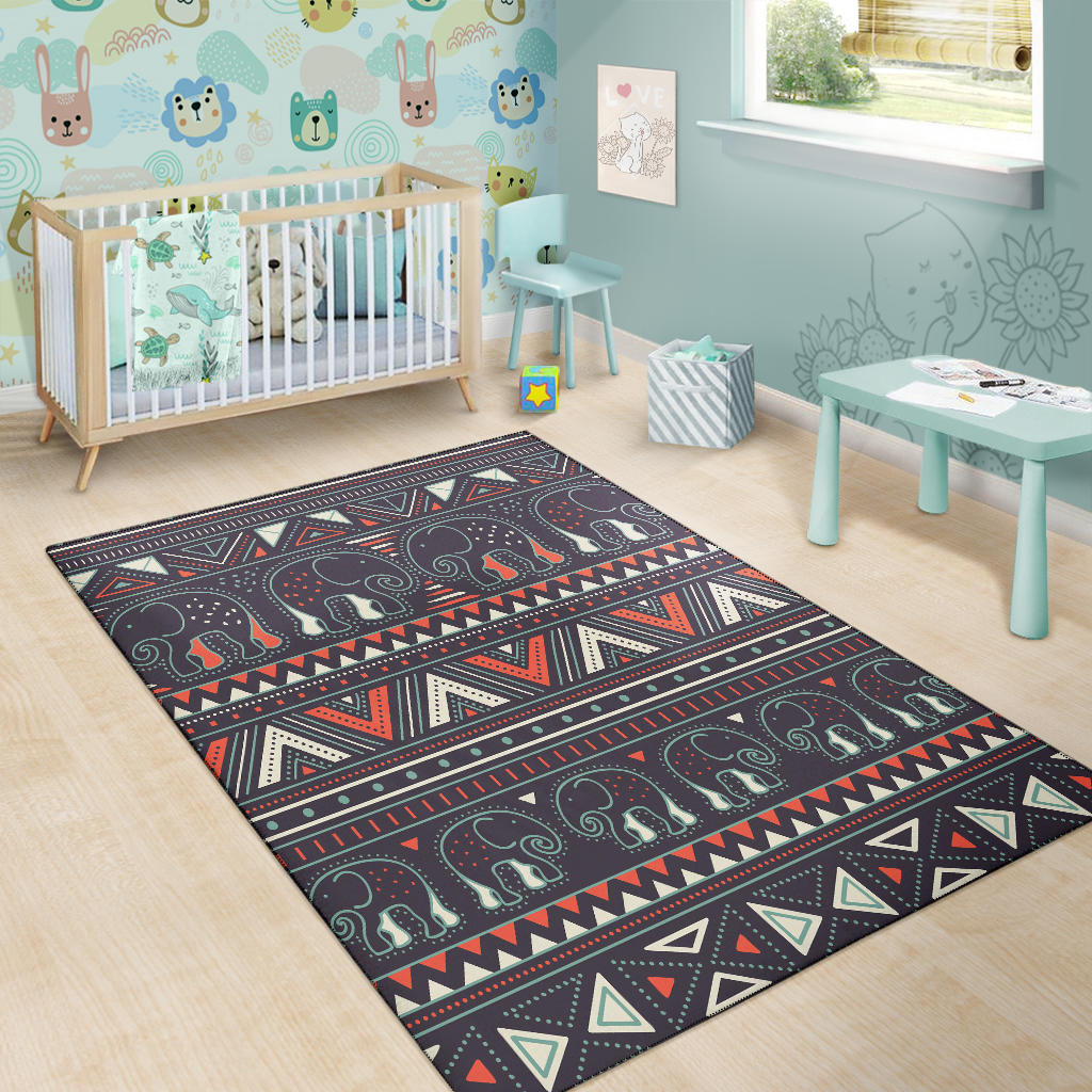 Kids-room area rug featuring tribal elephant motif on dark background with multicolor stripes
