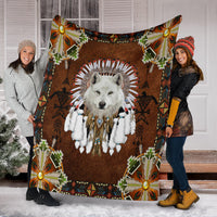 white-wolf-with-headress-feathers-blanket