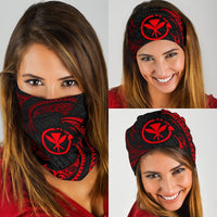 Red tribal wave bandana worn as face covering, black fabric with red Polynesian motif