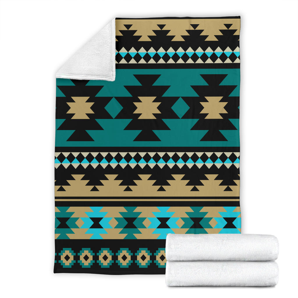 Teal Aztec pattern blanket with black, tan, and light-blue geometric borders