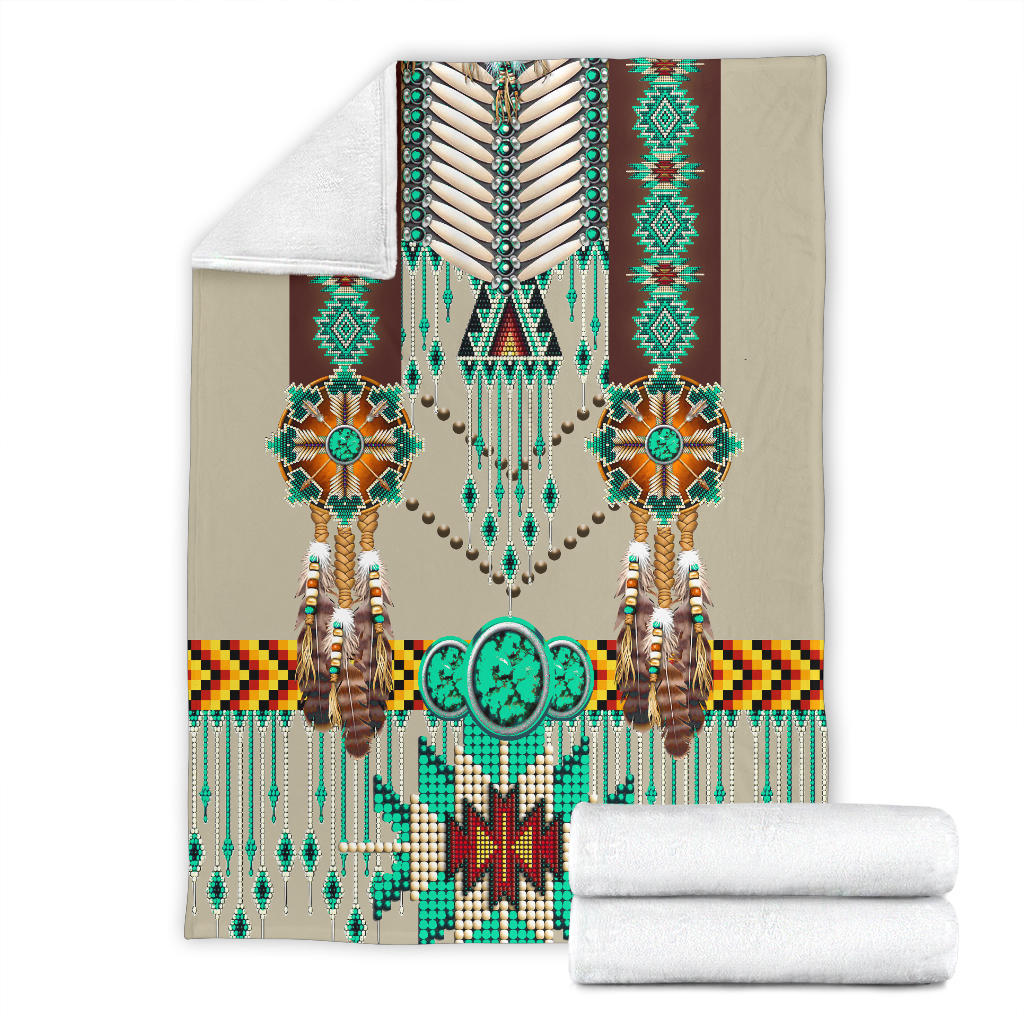 Breastplate blanket set: folded cream-and-white fleece with teal beadwork centerpiece