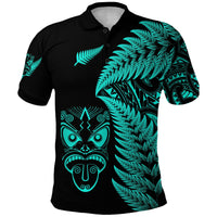 Black Maori polo shirt with turquoise fern patterns and carved face emblem front