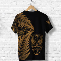 Black T-shirt back view with gold fern and tribal mask graphic